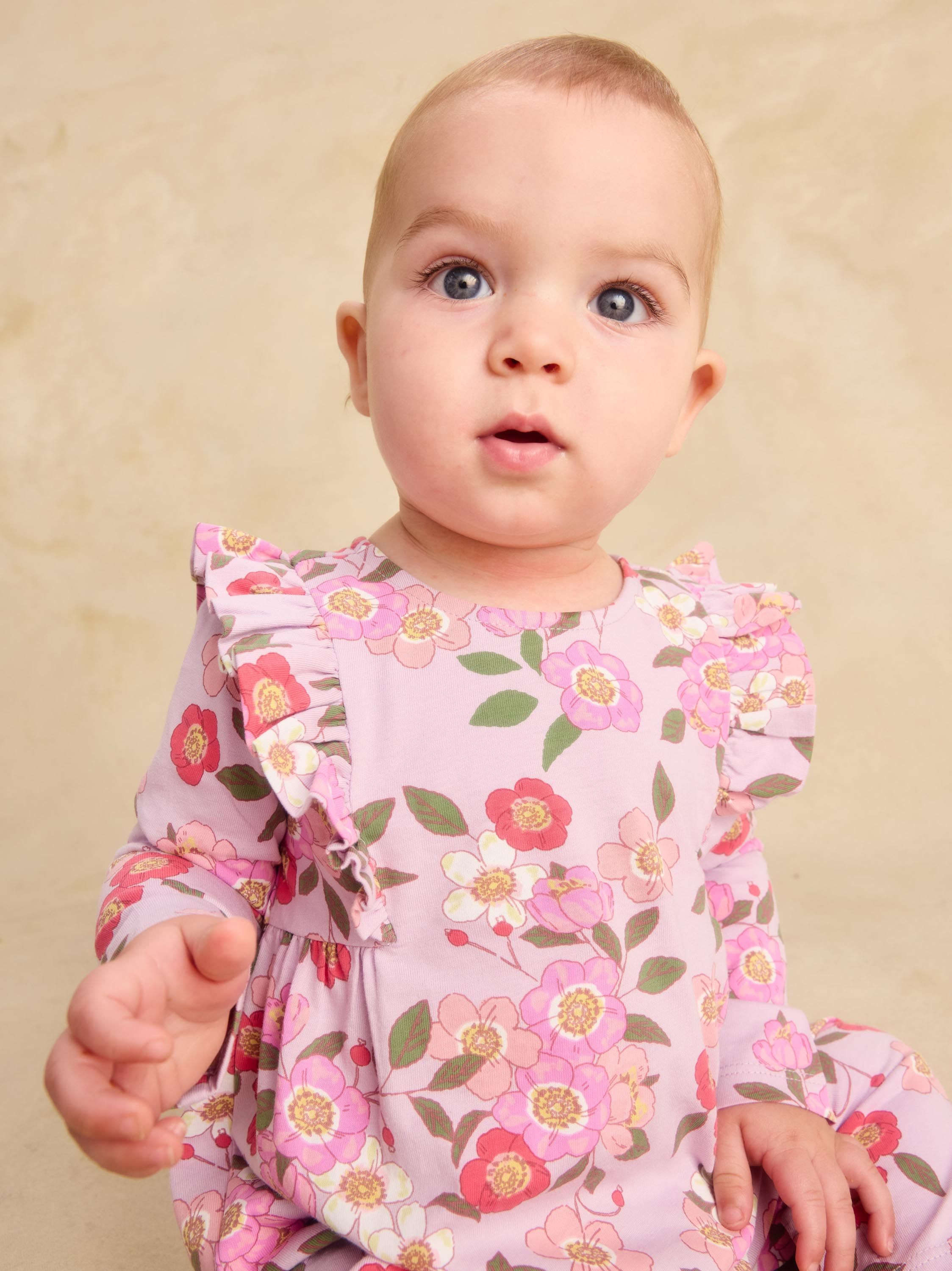 Rosa Canina Ruffle Shoulder Baby Romper