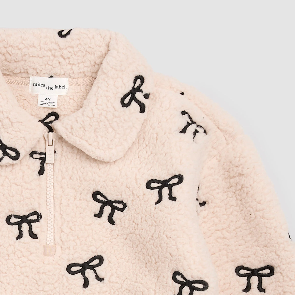 Beige Bow Sherpa Quarter Zip