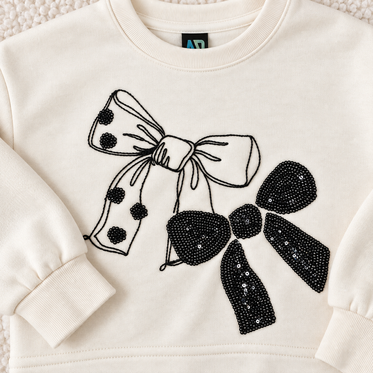Black Bow Embellished Ivory Sweatshirt