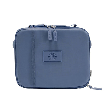 Blue travel bag with a visible brand logo on a white background