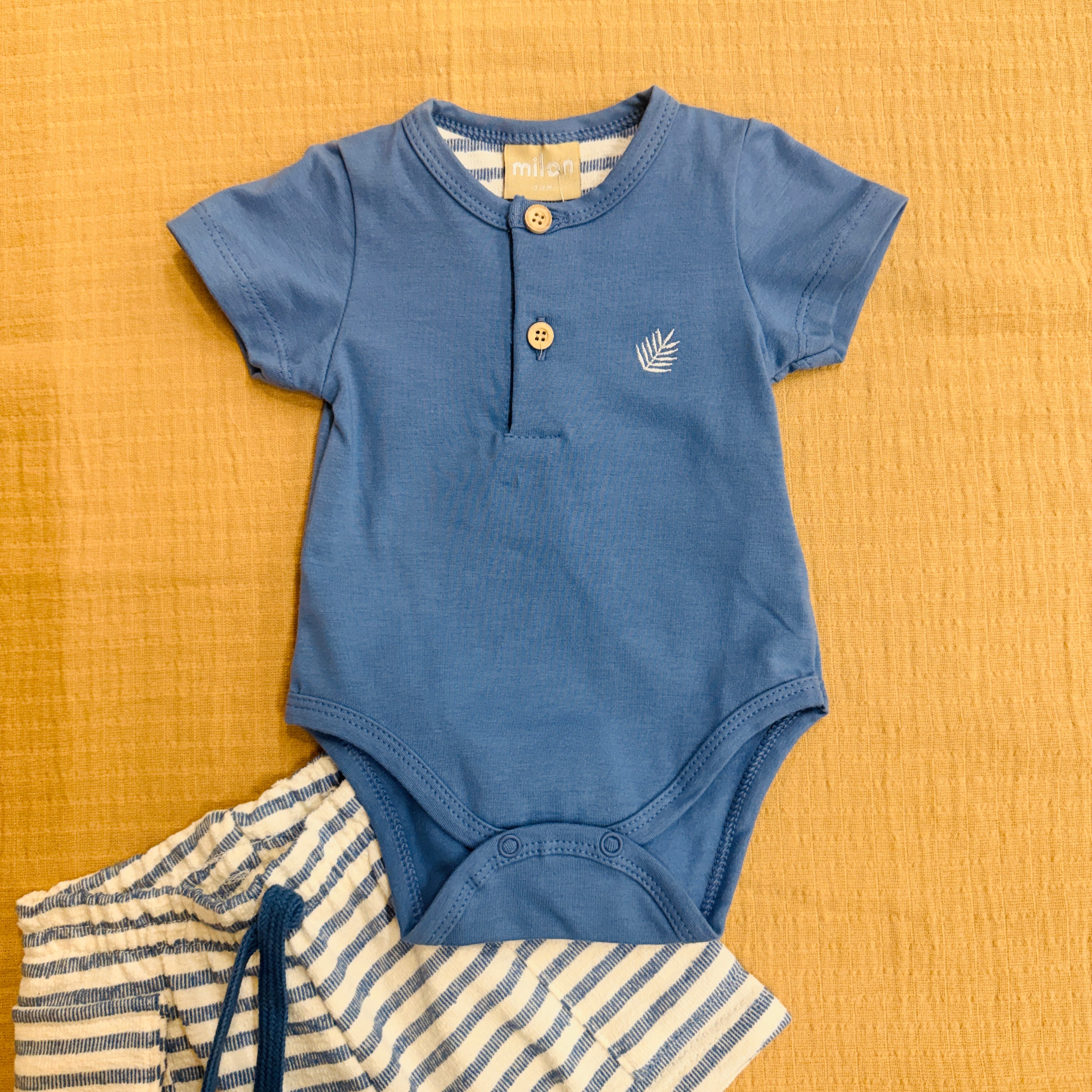 Solemn Blue Button Up Onesie