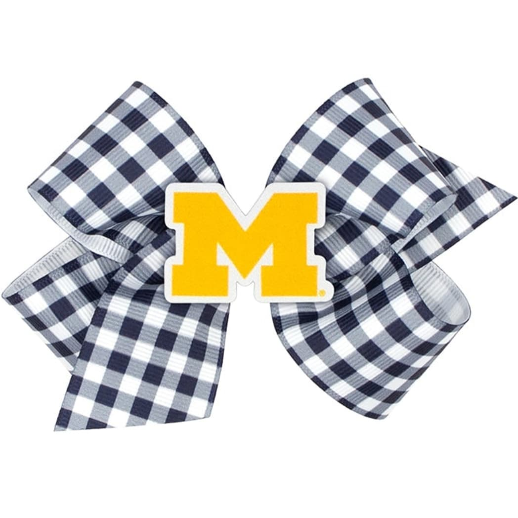 Navy and white checkered bow with yellow 'M' on a white background
