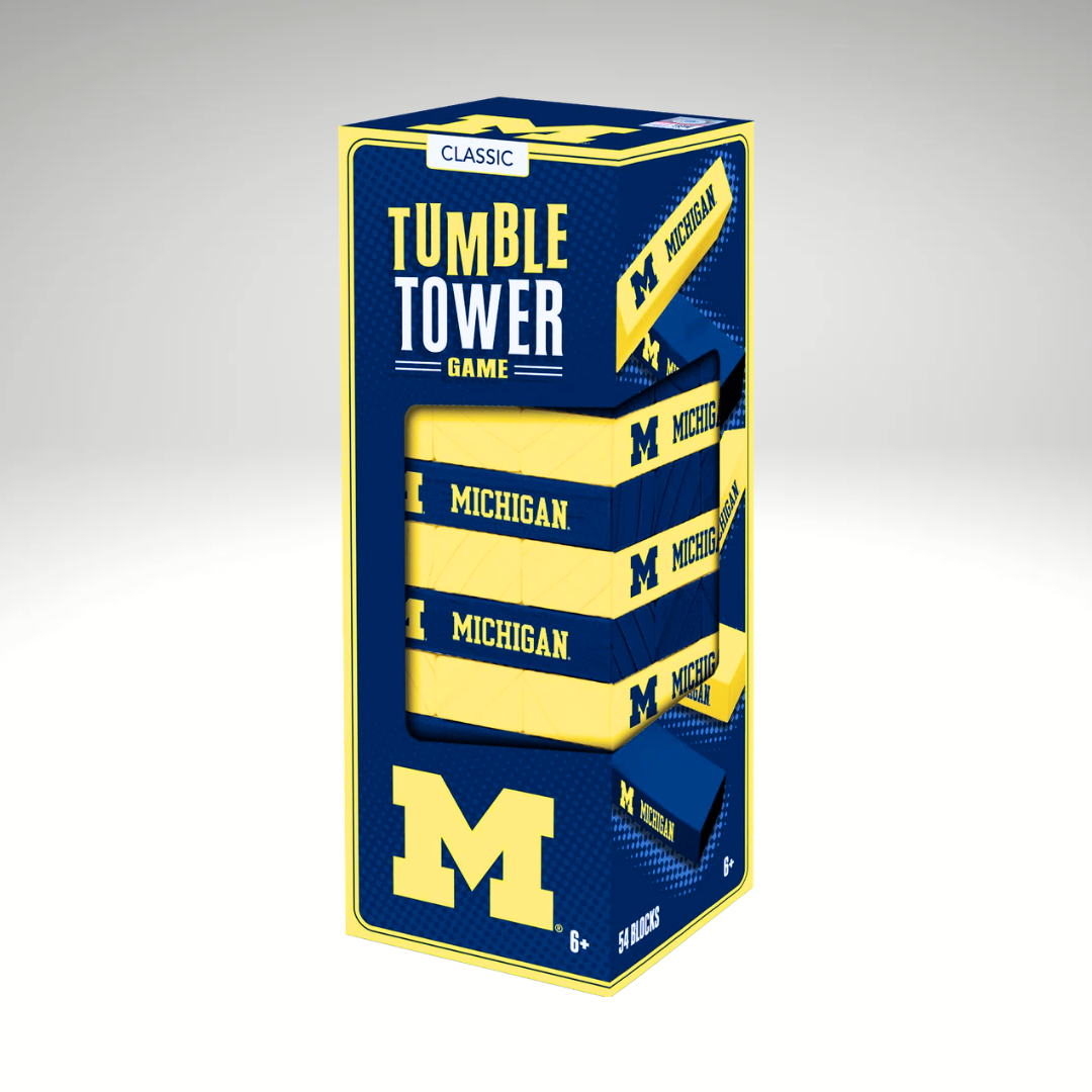 Box of Michigan-themed 'Tumble Tower' game on a gray background