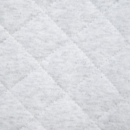 Close-up of a textured gray fabric with diamond pattern