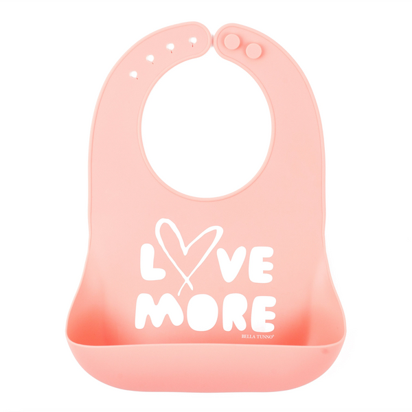 pink bib with words: Love More