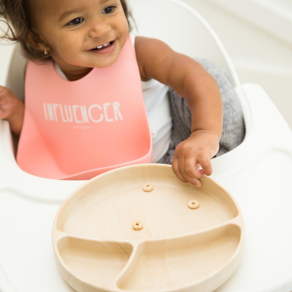 baby using wood plate