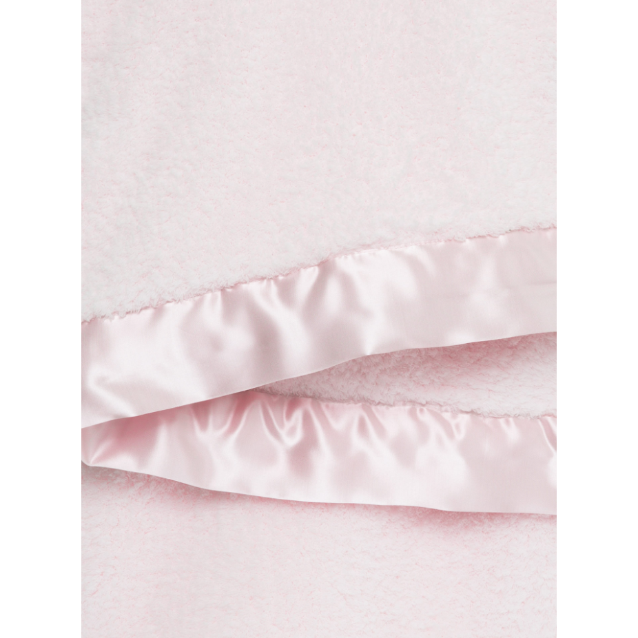 satin edge of pink blanket