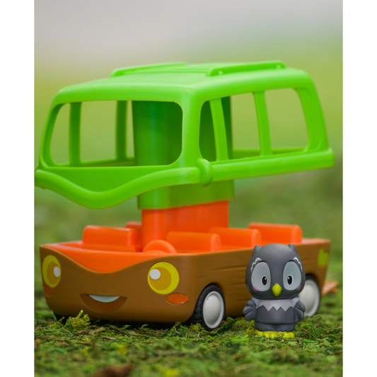 green adventure bus with small animal toy standing outside